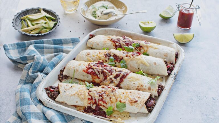 Cheesy Veggie Enchiladas with Black Beans